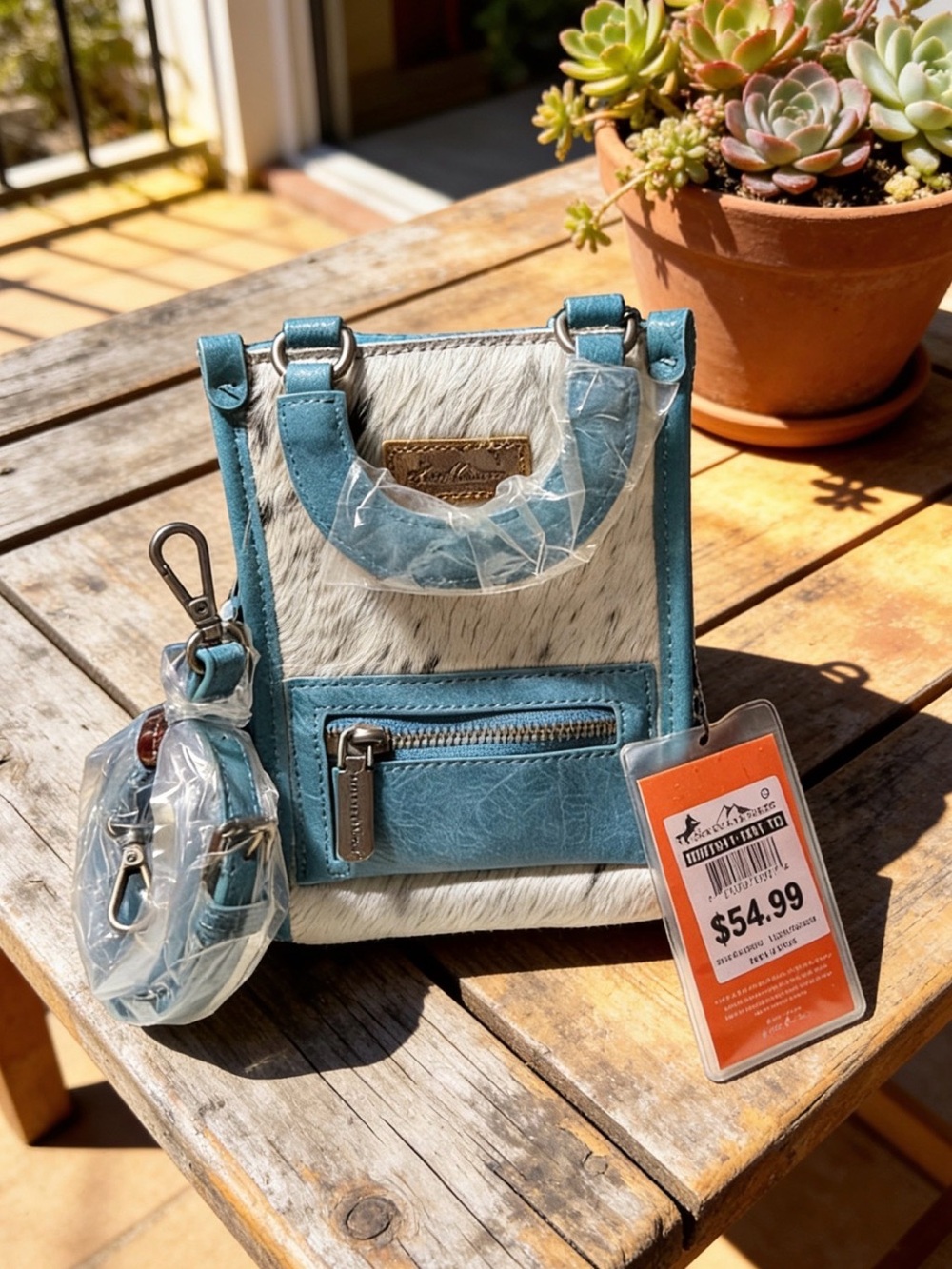 Montana West teal and cowhide purse